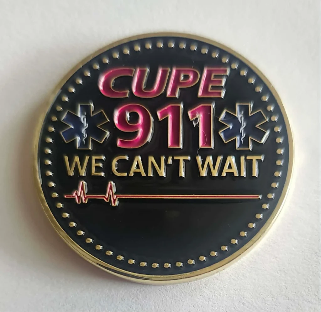 CUPE challenge coin featuring "CUPE 911 We Can't Wait", advocating for paramedic and police mental health support.